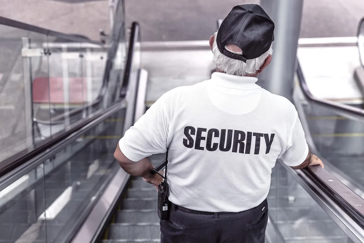 security, man, escalator, police, guard, officer, surveillance, control, monitoring, safety, uniform, back view, security, security, security, security, securit